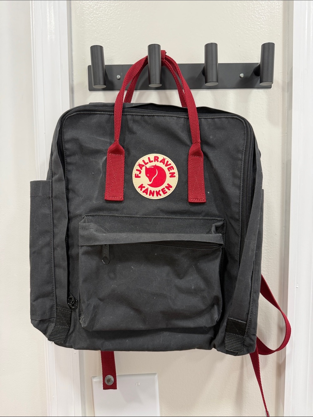 Fjallraven Kanken Backpack in Black with Red Straps